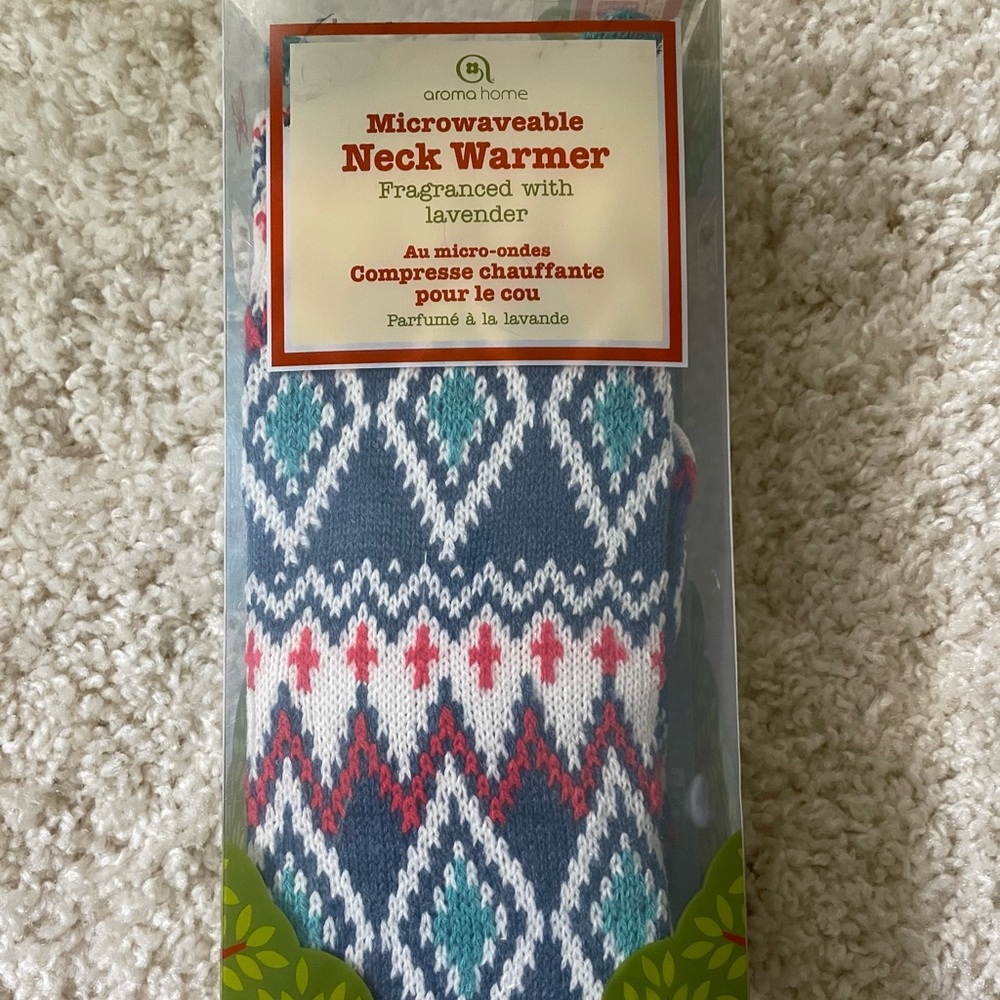 New in box never opened. Aroma home microwavable neck warmer